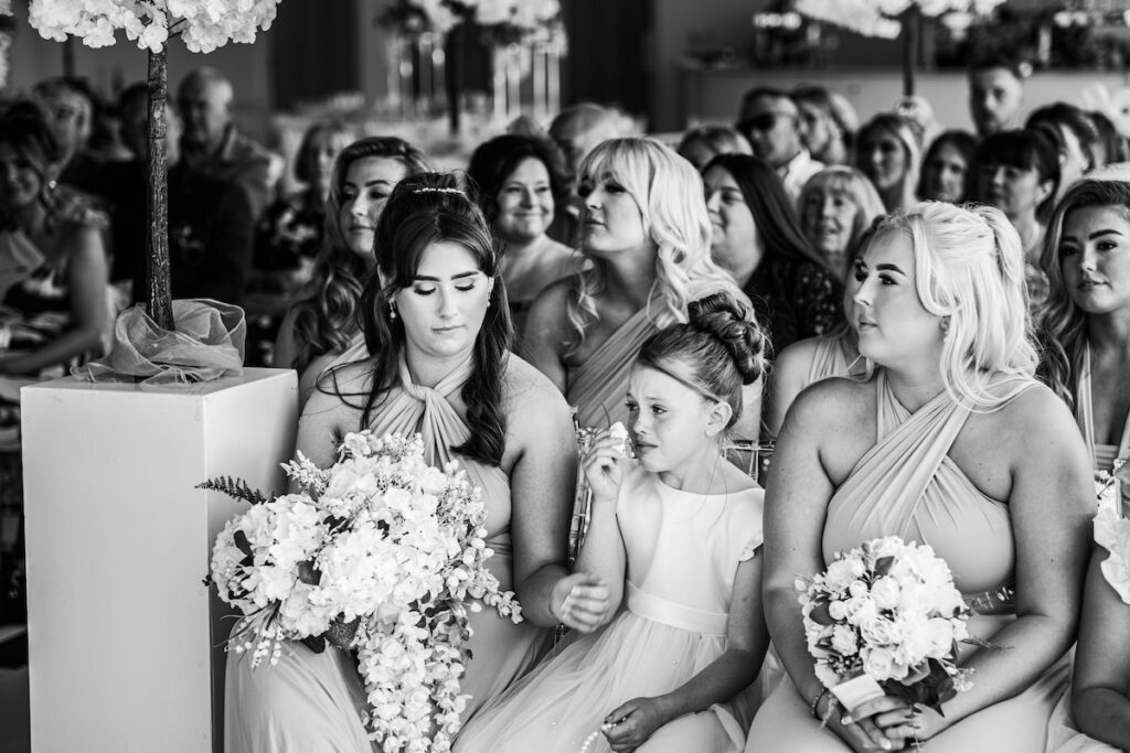 A black and white emotional bridesmaid