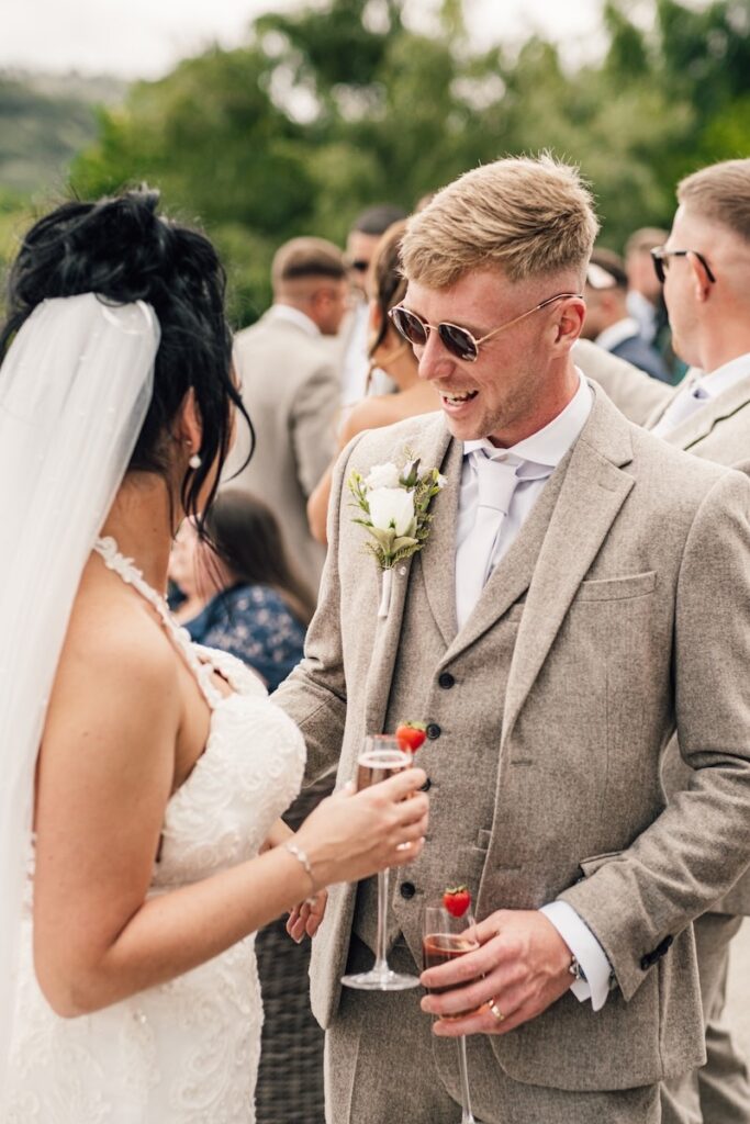 Bride and groom with drinks