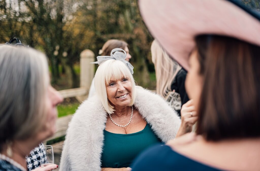 Wedding guest with hat