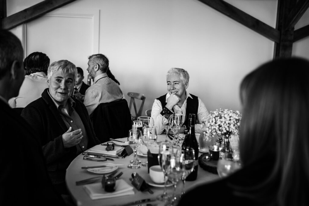 A black and white emotional wedding guest
