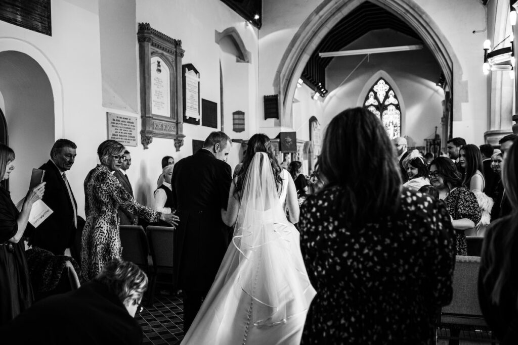 A father walking his daughter down the aisle