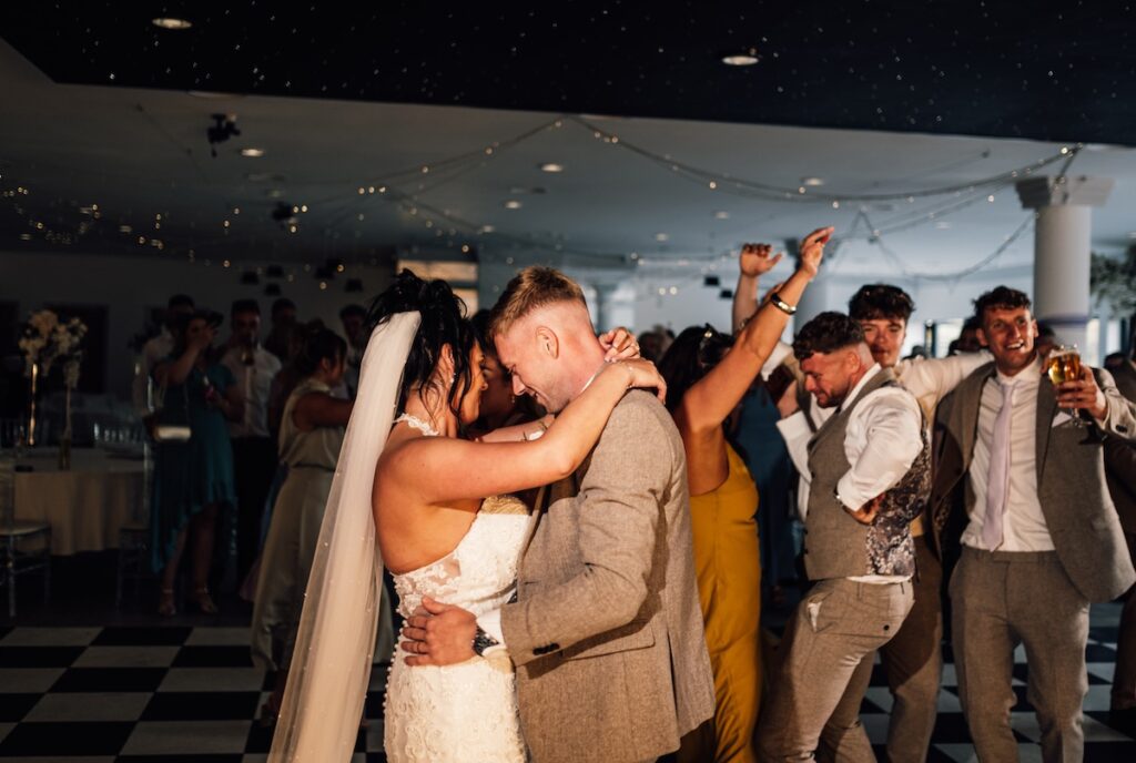 Couple having their first dance with guests