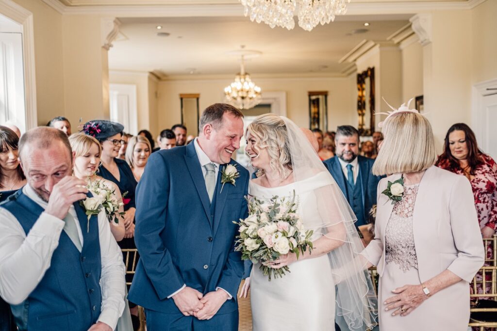 A happy couple during the wedding ceremony