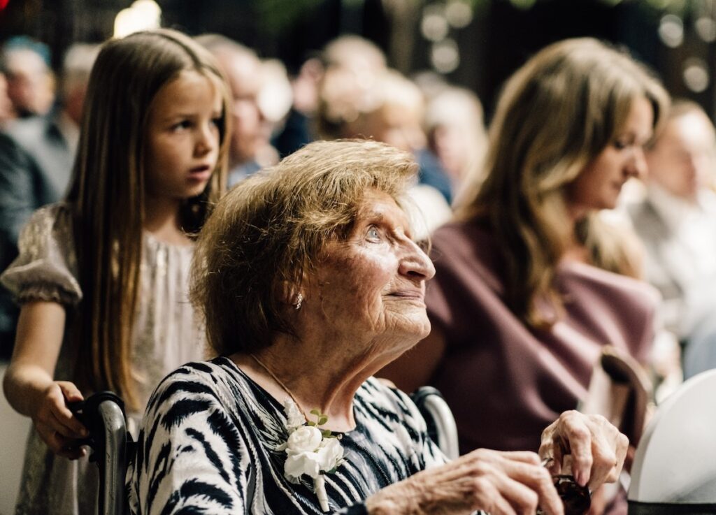 An elderly wedding guest