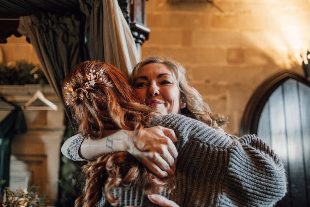 Happy hugs at a wedding