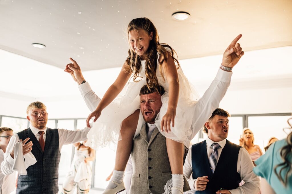 Daughter on Dad's shoulders