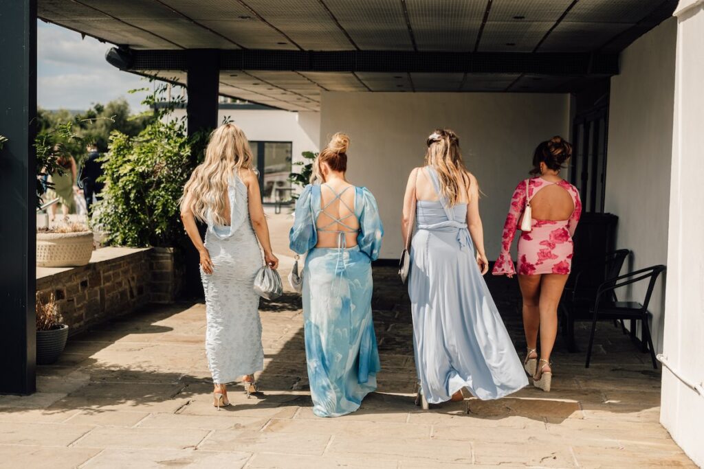 Colourful wedding guest outfits
