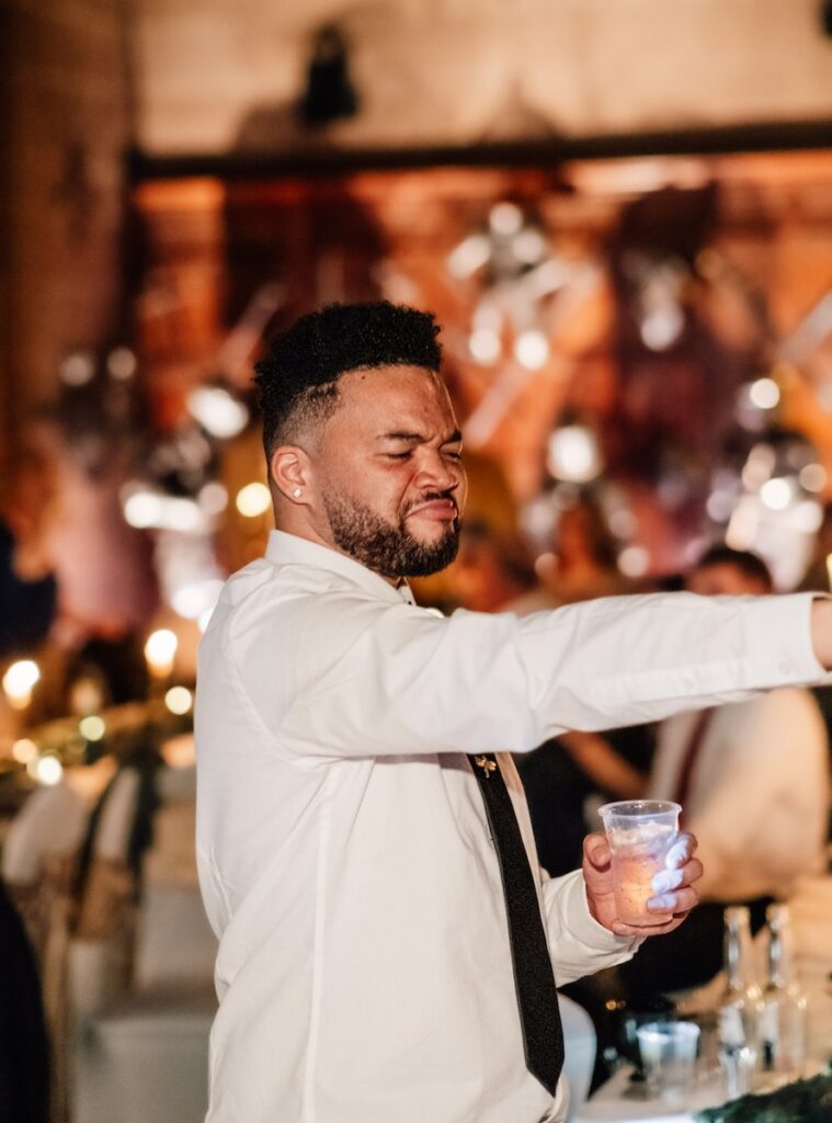 Wedding guest happy dancing