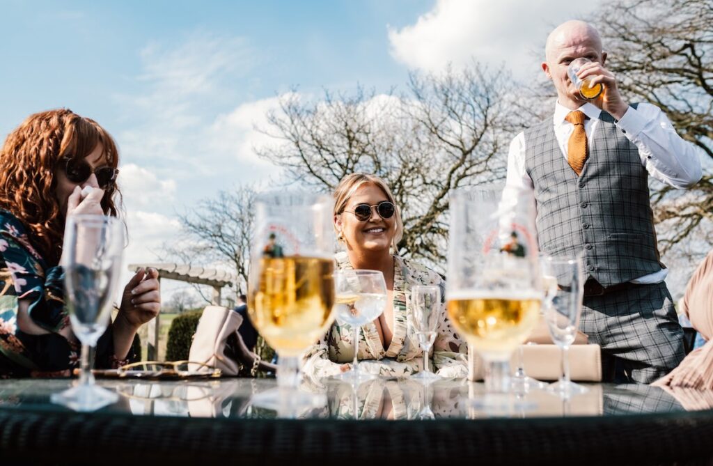 Wedding guests with their drinks