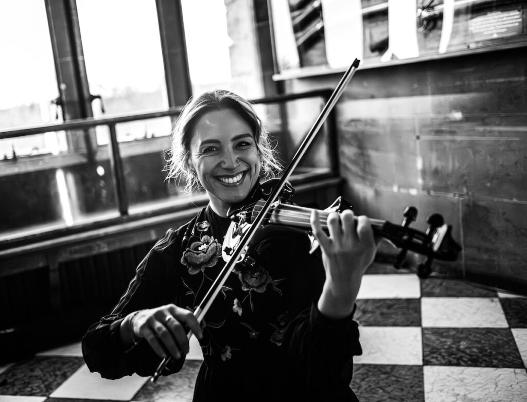 A black and white wedding violinist